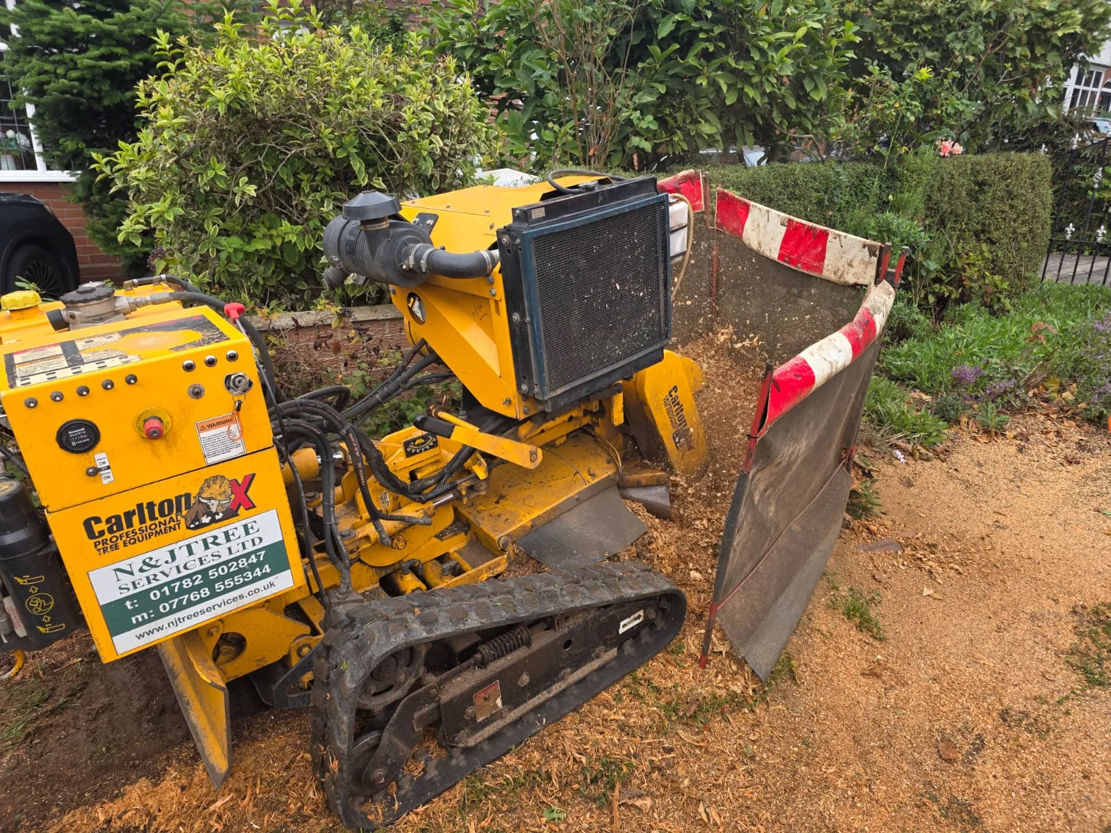 Carlton tracked stump grinder working within a protected verge area on Clumber Avenue